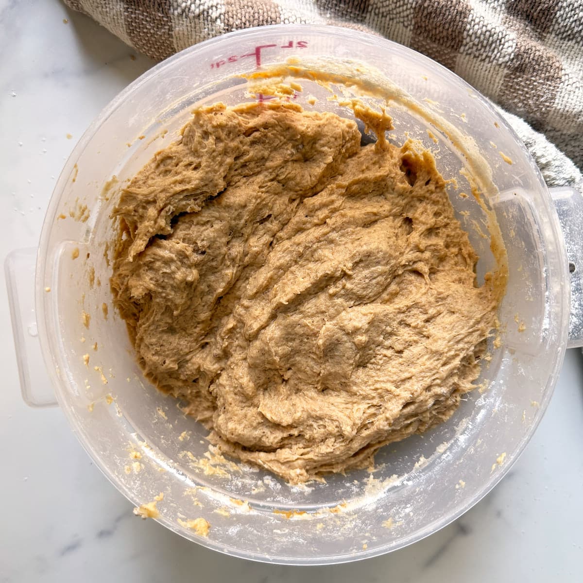 Freshly mixed pumpkin dough in a bowl