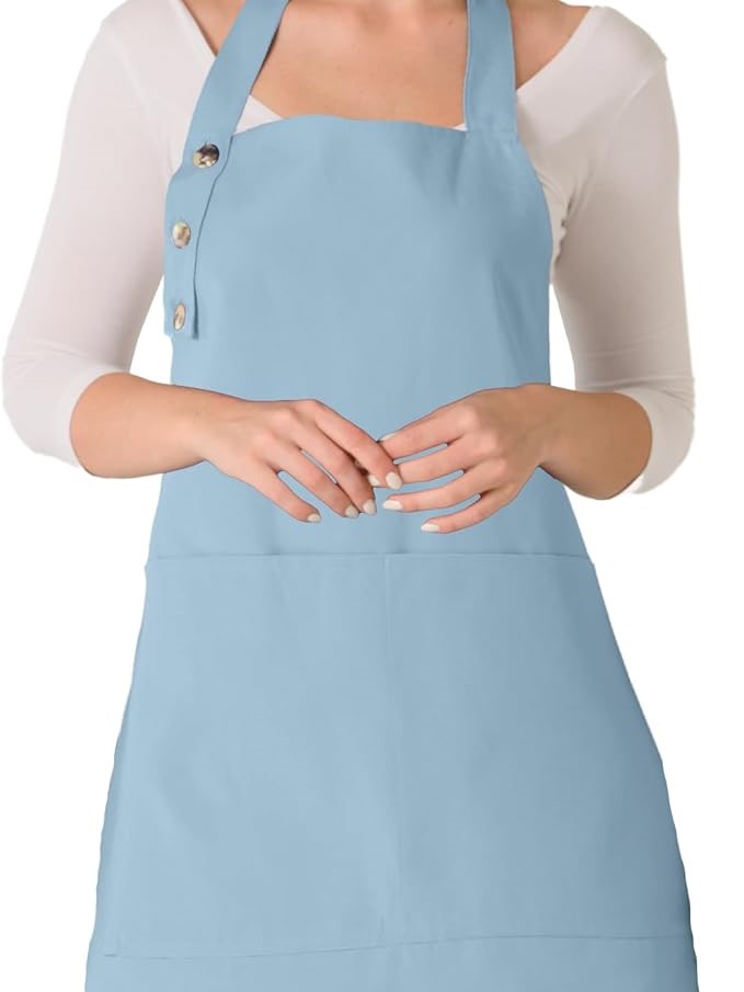 Light blue cotton kitchen apron with buttons on the strap